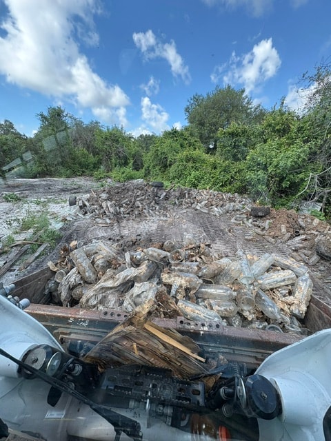 Skid steer land clearing
